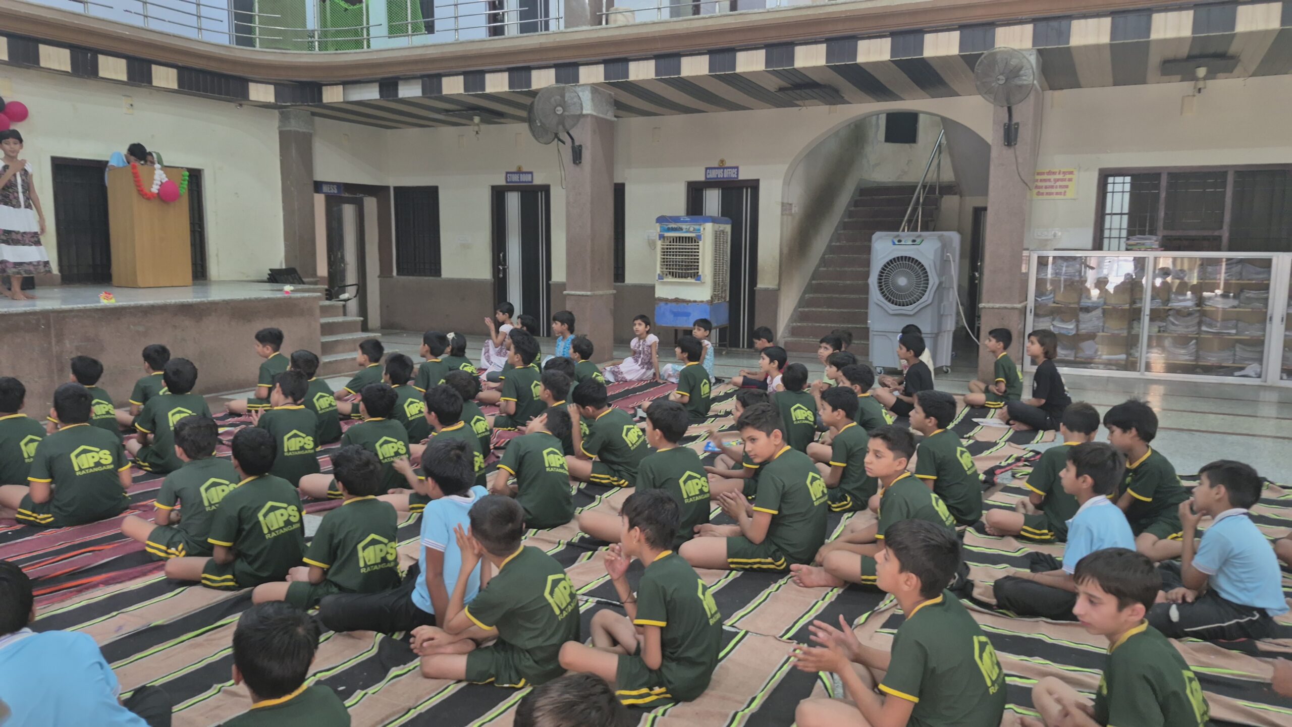 IPS Academy Ratangarh students seated together during a group activity session