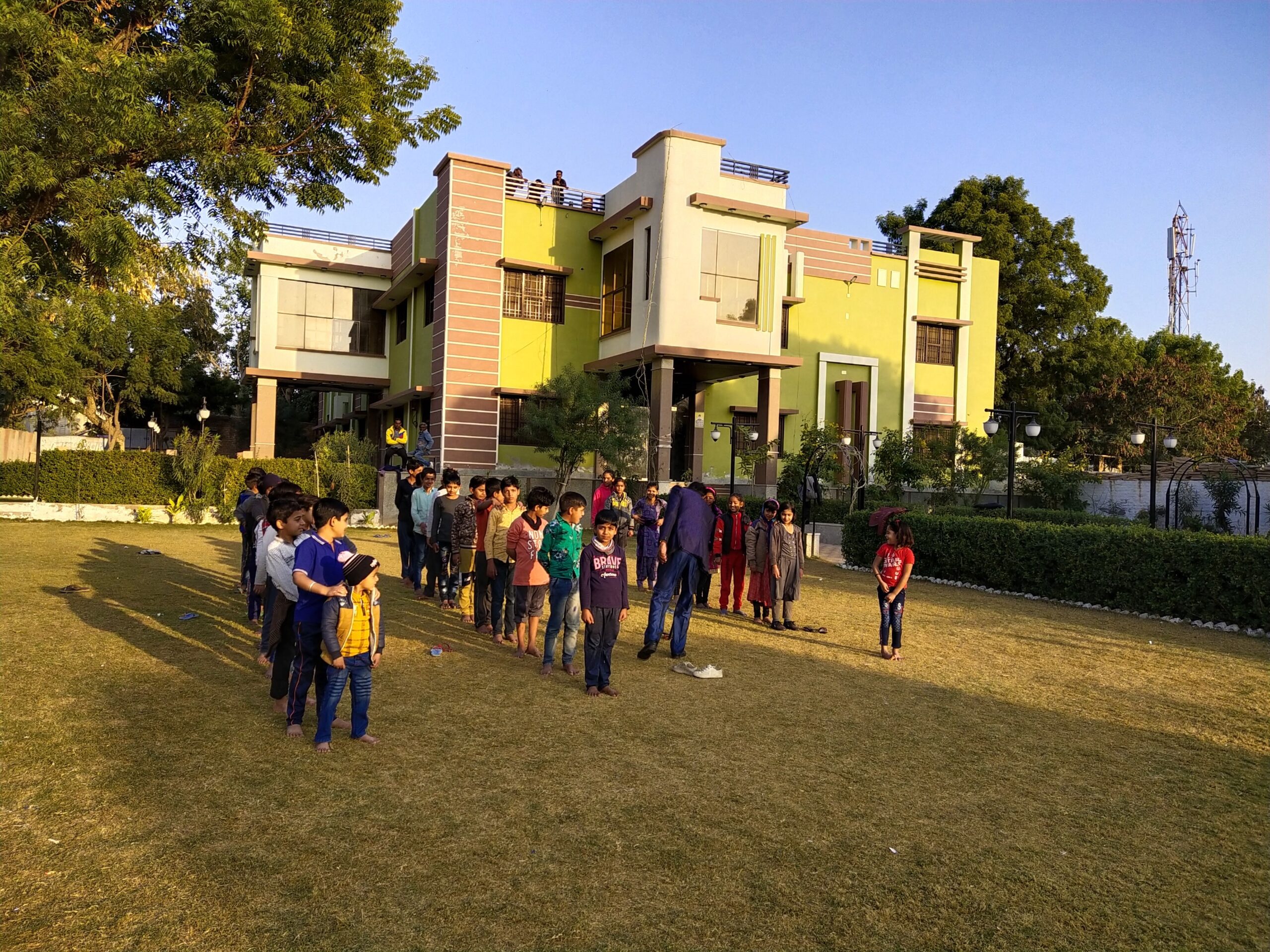 IPS Academy Ratangarh campus with students participating in an outdoor activity